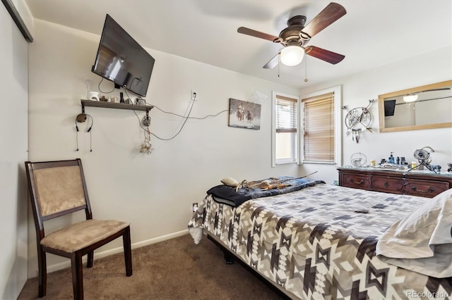 bedroom featuring carpet flooring, a ceiling fan, and baseboards