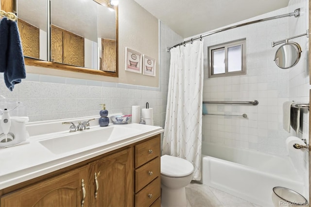 full bath featuring vanity, shower / bathtub combination with curtain, tile patterned flooring, tile walls, and toilet