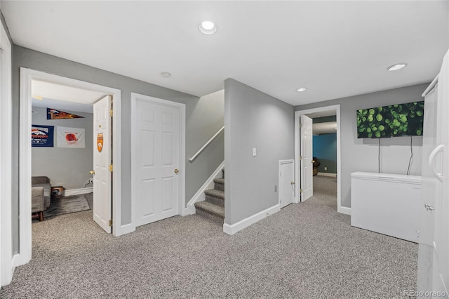15157 E Nassau Ave, Aurora, CO 80014 - basement with carpet floors, stairway, recessed lighting, and fridge