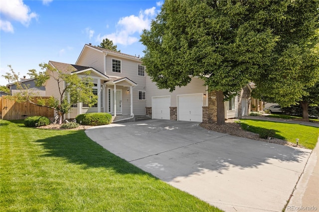 15157 E Nassau Ave, Aurora, CO 80014 - view of front of home with concrete driveway and a garage
