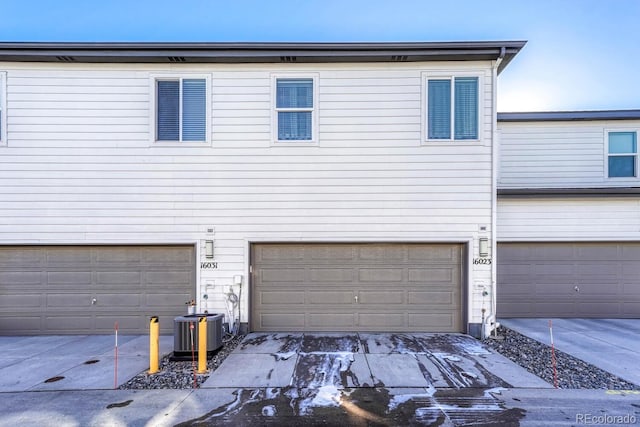 garage featuring central AC unit