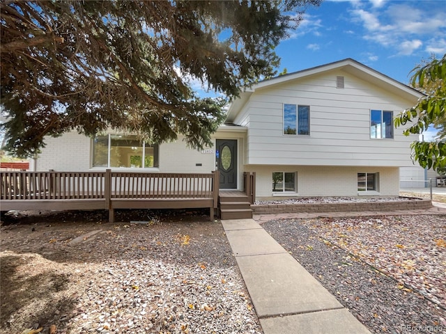 view of front of property featuring a wooden deck