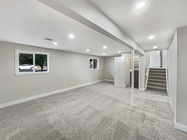 basement with light carpet