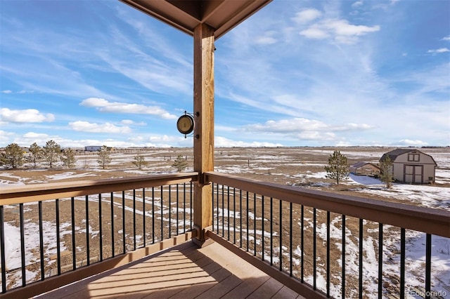 view of snow covered deck