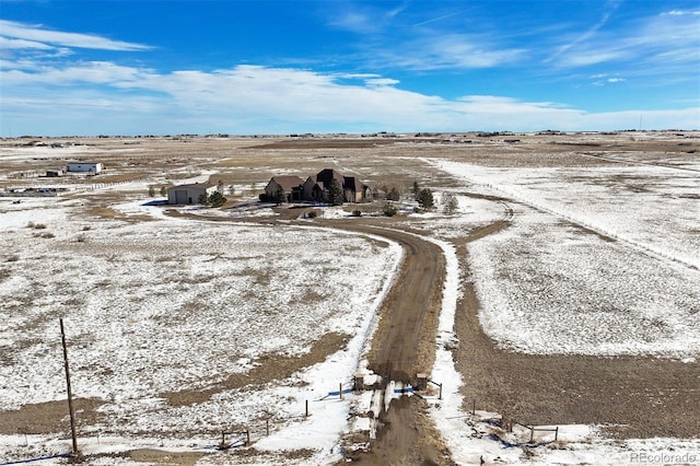 snowy aerial view with a rural view