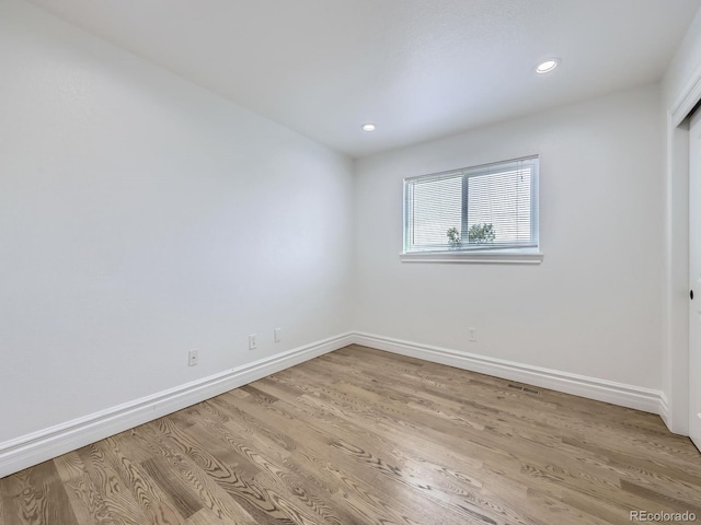 2830 E 99th Way, Thornton, CO 80229 - spare room featuring light wood finished floors and recessed lighting