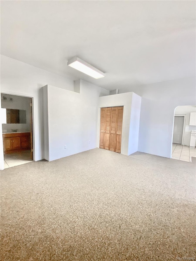 empty room with light carpet