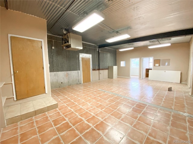 unfurnished room featuring tile patterned floors