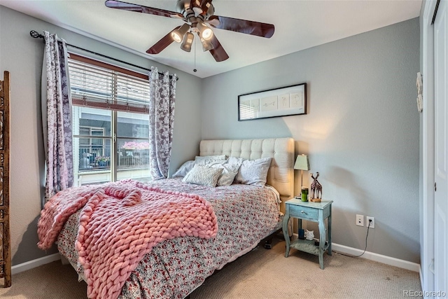 bedroom with baseboards, carpet floors, and ceiling fan