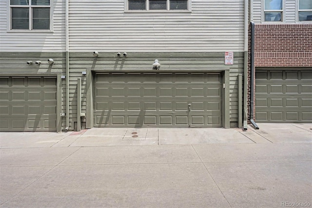 garage featuring driveway