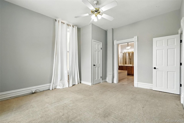 2346 N Gilpin St, Denver, CO 80205 - unfurnished bedroom with carpet flooring, ensuite bathroom, and ceiling fan