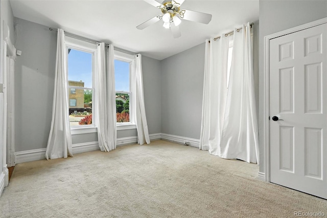 2346 N Gilpin St, Denver, CO 80205 - unfurnished room with carpet floors and ceiling fan