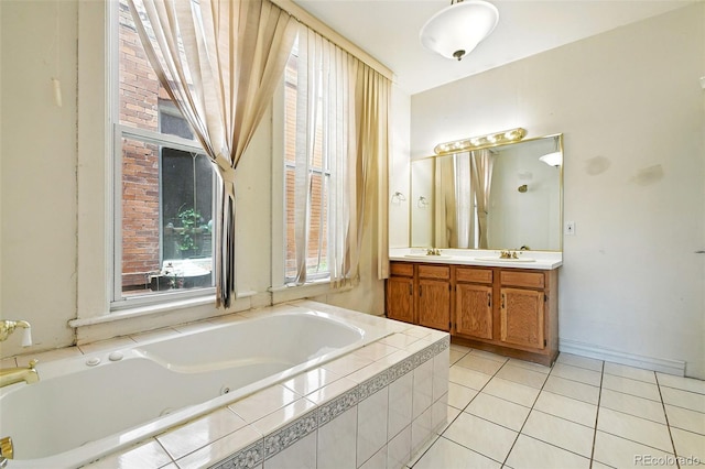 2346 N Gilpin St, Denver, CO 80205 - bathroom featuring double vanity, a jetted tub, and tile patterned flooring