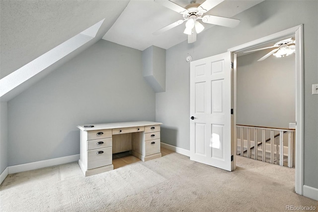2346 N Gilpin St, Denver, CO 80205 - unfurnished office with a ceiling fan, light colored carpet, a skylight, and vaulted ceiling