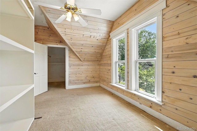 2346 N Gilpin St, Denver, CO 80205 - additional living space with wooden walls, vaulted ceiling, carpet, and ceiling fan