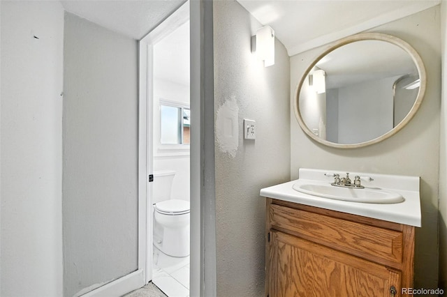 2346 N Gilpin St, Denver, CO 80205 - bathroom featuring vanity and toilet