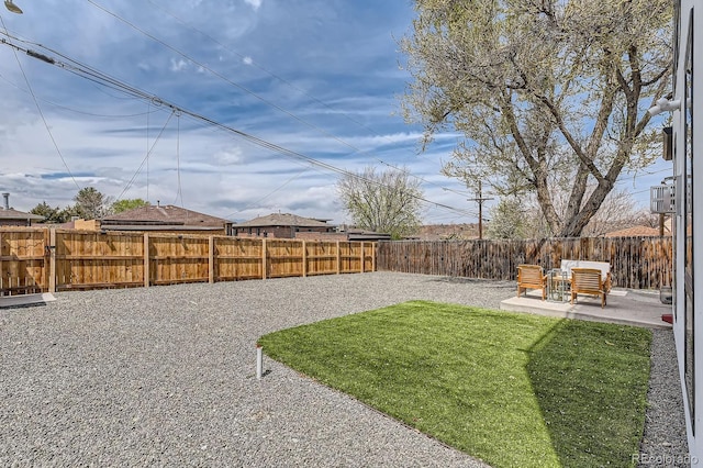 1655 Wolff St, Denver, CO 80204 - view of yard featuring a patio area