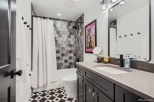 1655 Wolff St, Denver, CO 80204 - bathroom featuring vanity, tile patterned floors, toilet, and shower / tub combo with curtain