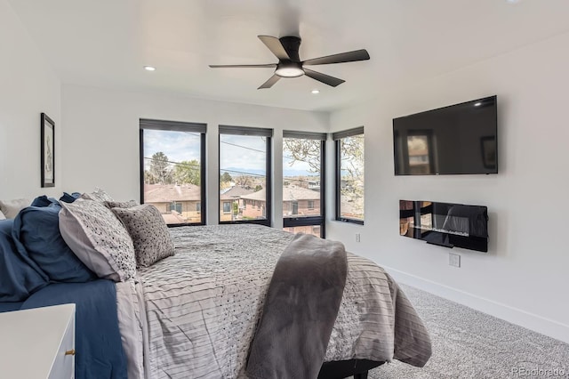 1655 Wolff St, Denver, CO 80204 - carpeted bedroom featuring recessed lighting, baseboards, and a ceiling fan