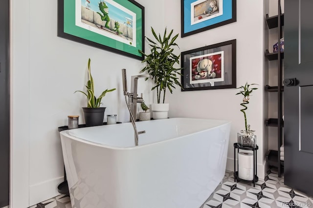 1655 Wolff St, Denver, CO 80204 - bathroom view of tile patterned floors and a freestanding tub