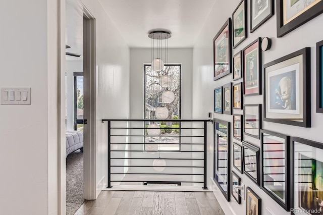 1655 Wolff St, Denver, CO 80204 - hall with wood finished floors and an upstairs landing