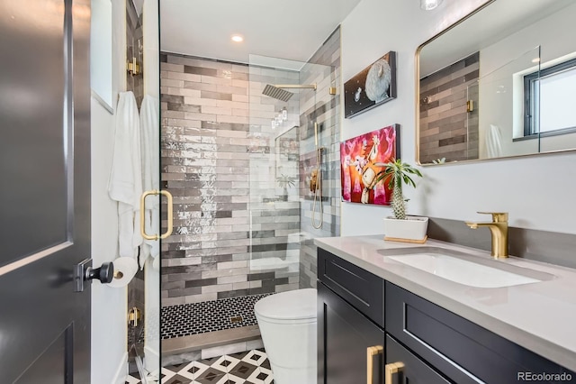 1655 Wolff St, Denver, CO 80204 - bathroom featuring vanity, a shower stall, toilet, and recessed lighting