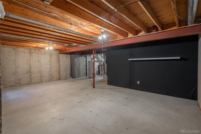 basement featuring water heater