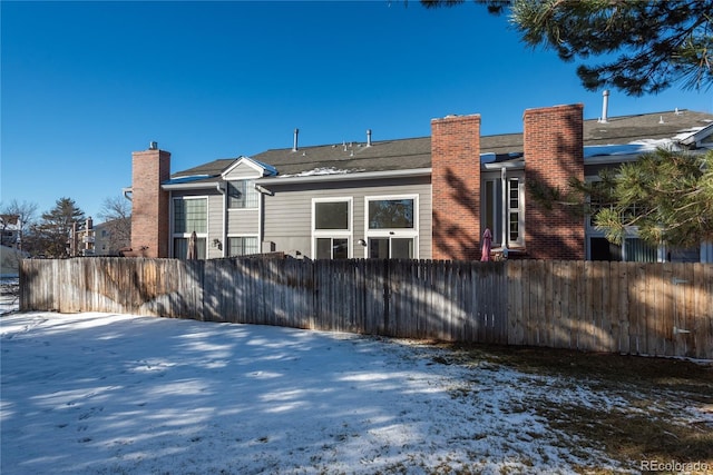 view of snow covered property