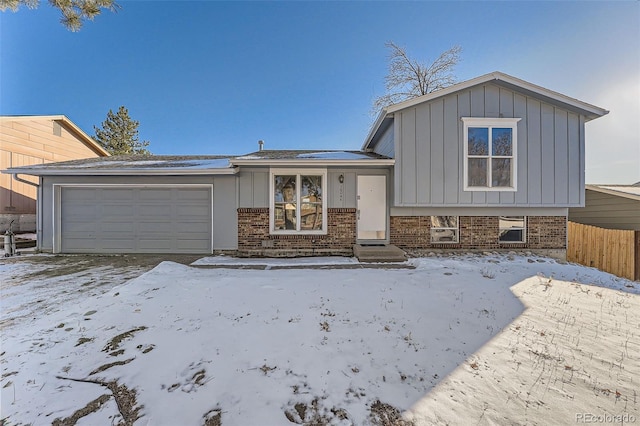 split level home featuring a garage