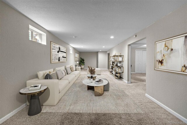8305 Eaton Way, Arvada, CO 80003 - living room with carpet floors, a textured wall, a textured ceiling, and baseboards