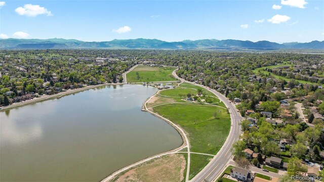 8305 Eaton Way, Arvada, CO 80003 - aerial overview of property's location with a water and mountain view