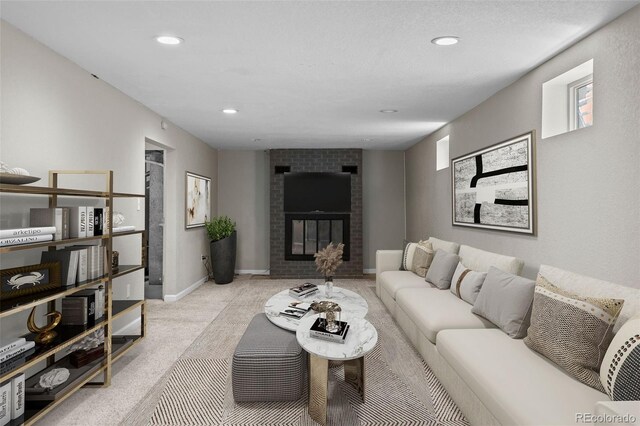 8305 Eaton Way, Arvada, CO 80003 - living room featuring light carpet, recessed lighting, a fireplace, and baseboards