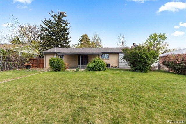 8305 Eaton Way, Arvada, CO 80003 - back of house featuring a chimney