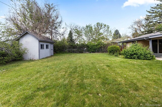 8305 Eaton Way, Arvada, CO 80003 - view of yard featuring an outdoor structure