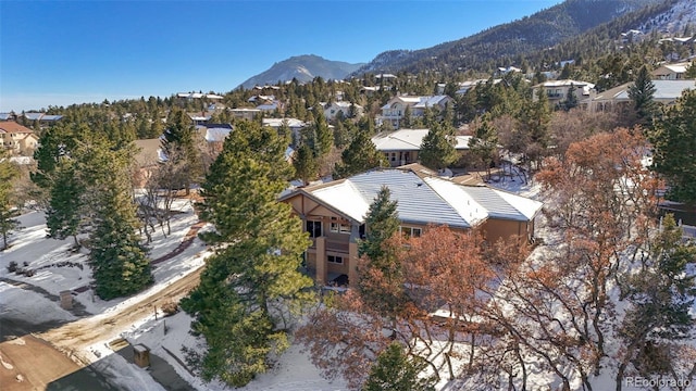 birds eye view of property with a mountain view