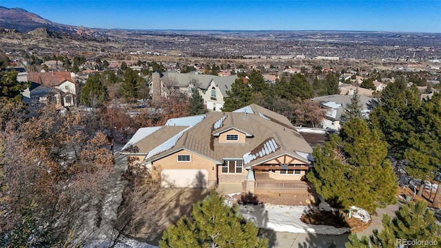 drone / aerial view featuring a mountain view