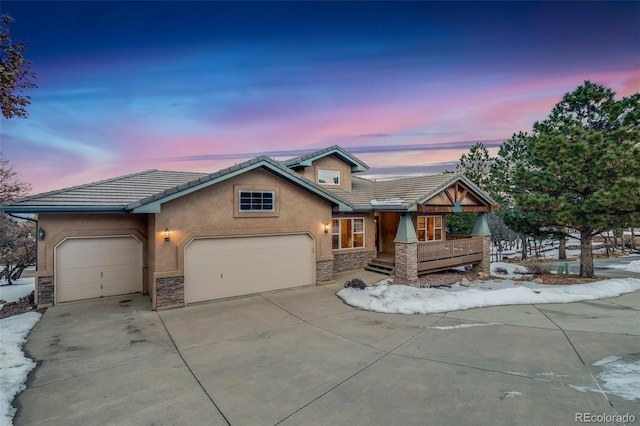 craftsman inspired home with a garage