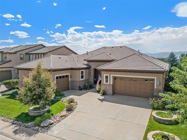 view of front of home with a garage