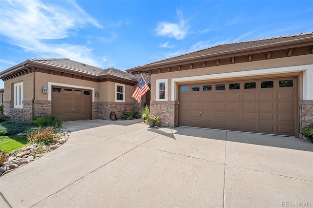 view of front of home with a garage