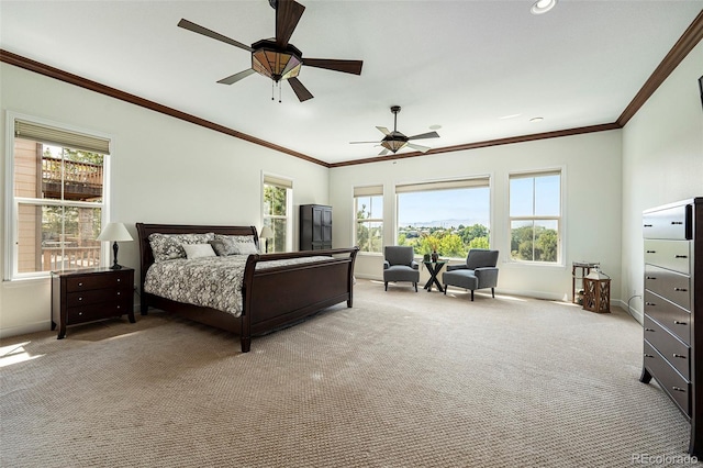 bedroom featuring light carpet, crown molding, and ceiling fan