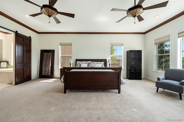 carpeted bedroom featuring crown molding, a barn door, and ceiling fan