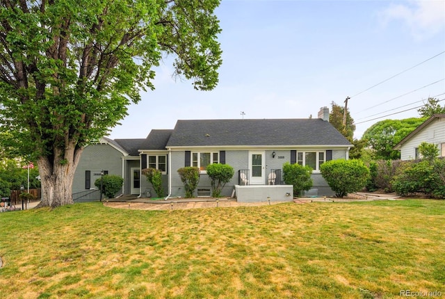 3888 Estes St, Wheat Ridge, CO 80033 - back of property with a chimney