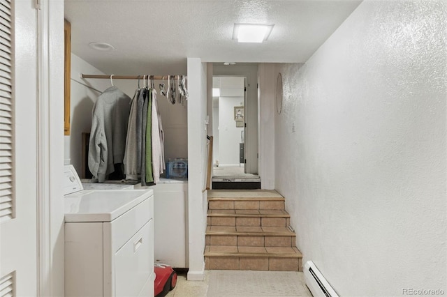 3888 Estes St, Wheat Ridge, CO 80033 - washroom with separate washer and dryer, a textured wall, and a textured ceiling