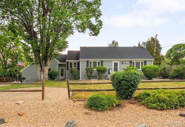 3888 Estes St, Wheat Ridge, CO 80033 - ranch-style house with a chimney