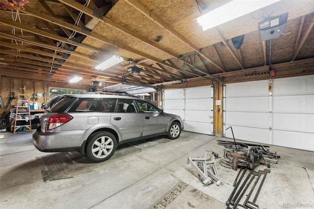 3888 Estes St, Wheat Ridge, CO 80033 - garage featuring a garage door opener