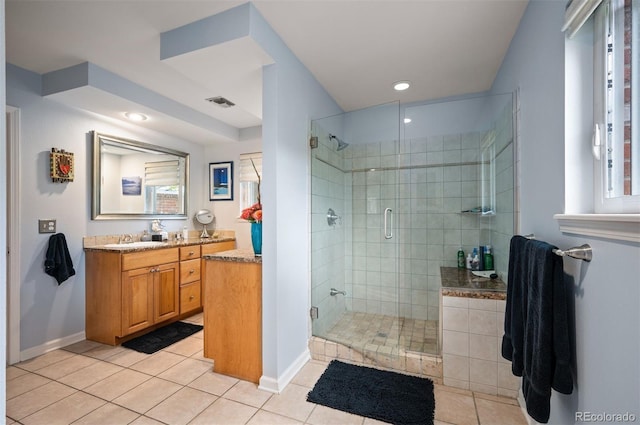 4011 S Ivy Ln, Cherry Hills Village, CO 80111 - bathroom with vanity, tile patterned floors, a stall shower, and recessed lighting