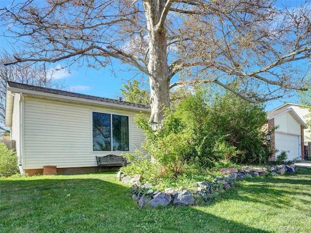 view of home's exterior featuring a lawn