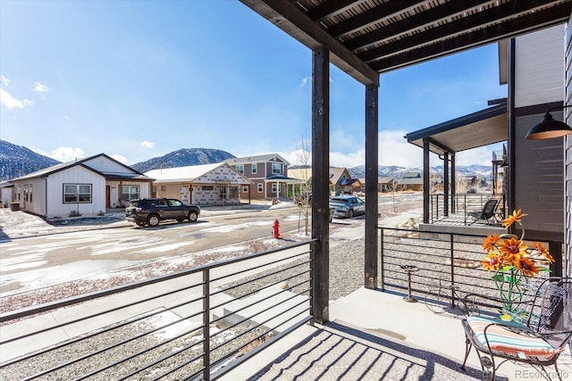 balcony featuring a mountain view