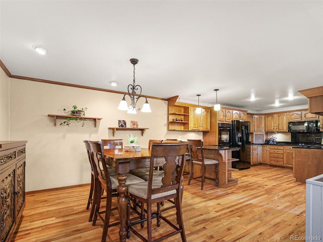 8791 Grizzly Way, Evergreen, CO 80439 - dining room featuring crown molding, light wood-type flooring, and baseboards