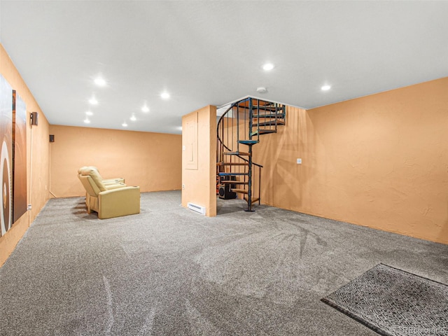 8791 Grizzly Way, Evergreen, CO 80439 - finished basement with stairway, carpet flooring, recessed lighting, and a baseboard heating unit
